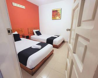 Hotel Dulce Luna - סן קריסטובל דה לס קאסאס - חדר שינה