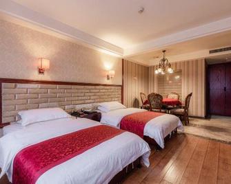 Hengda Hotel (High-speed Railway Station Branch) - Tongren - Camera da letto