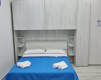 punto house - Неаполь - Спальня