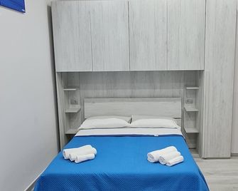 punto house - Неаполь - Спальня