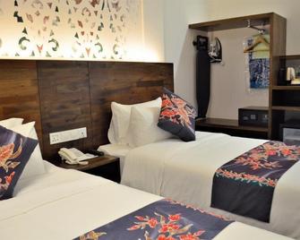 Serapi Hotel - Kuching - Habitación