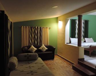 Enjoy The Real 'Wayanad village home stay' experience. - Meenangadi - Sala de estar