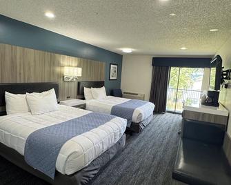Oyster Bay Inn & Suites - Bremerton - Спальня