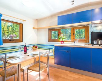 Camping Village Laguna Blu - Fertilia - Kitchen