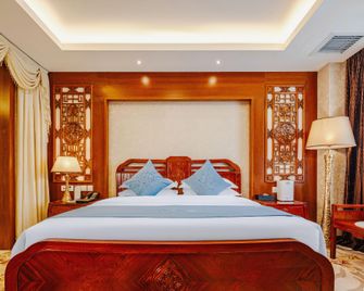 Adange Hotel - Lijiang - Bedroom