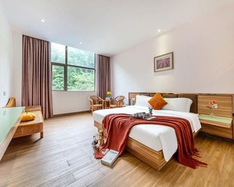 Guangdong Hotel (Jiangmen Xinhui Xinghui Plaza Xiangshan Park) - Jiangmen - Camera da letto