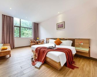 Guangdong Hotel (Jiangmen Xinhui Xinghui Plaza Xiangshan Park) - Jiangmen - Bedroom