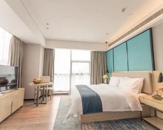 Echarm Hotel Yangzhou Jiangdu Jinyin Plaza - Yangzhou - Habitación