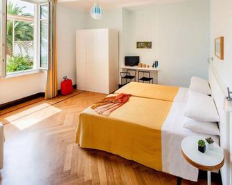 أوتيل بو سيجور - ألاسيو - غرفة نوم