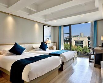 Dongpo Hotel - Hangzhou - Bedroom