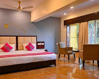 Resort The Karishma Grand - 帕納吉 - 臥室