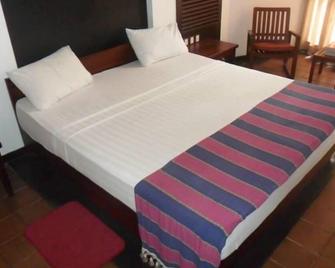 Hotel Sapthapadhi - Ratnapura - Ložnice