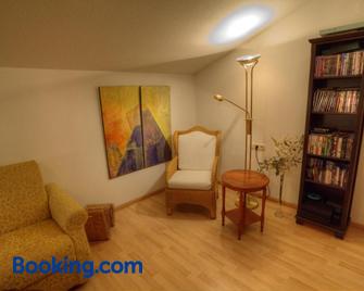 Mountain Inn Chalets & Apartments - Walchsee - Living room
