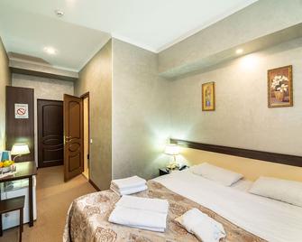 Mildom Express - Almaty - Bedroom