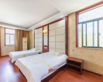 Starlight Express Hotel (Sanzhong Branch) - Tongling - Bedroom