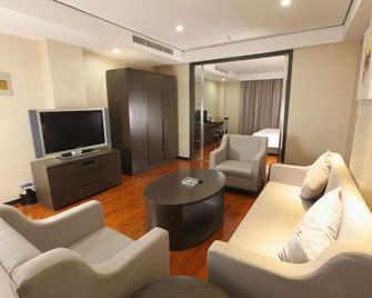 Chizhou Yinxing Business Hotel - Chizhou - Living room