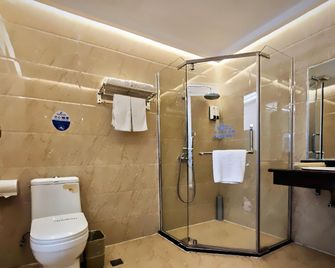 Greentree Inn Hunan Jishou Longshan Yuelu Avenue Business Hotel - Enshi - Bedroom