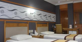 Hotel Yasmin - Jayapura - Bedroom