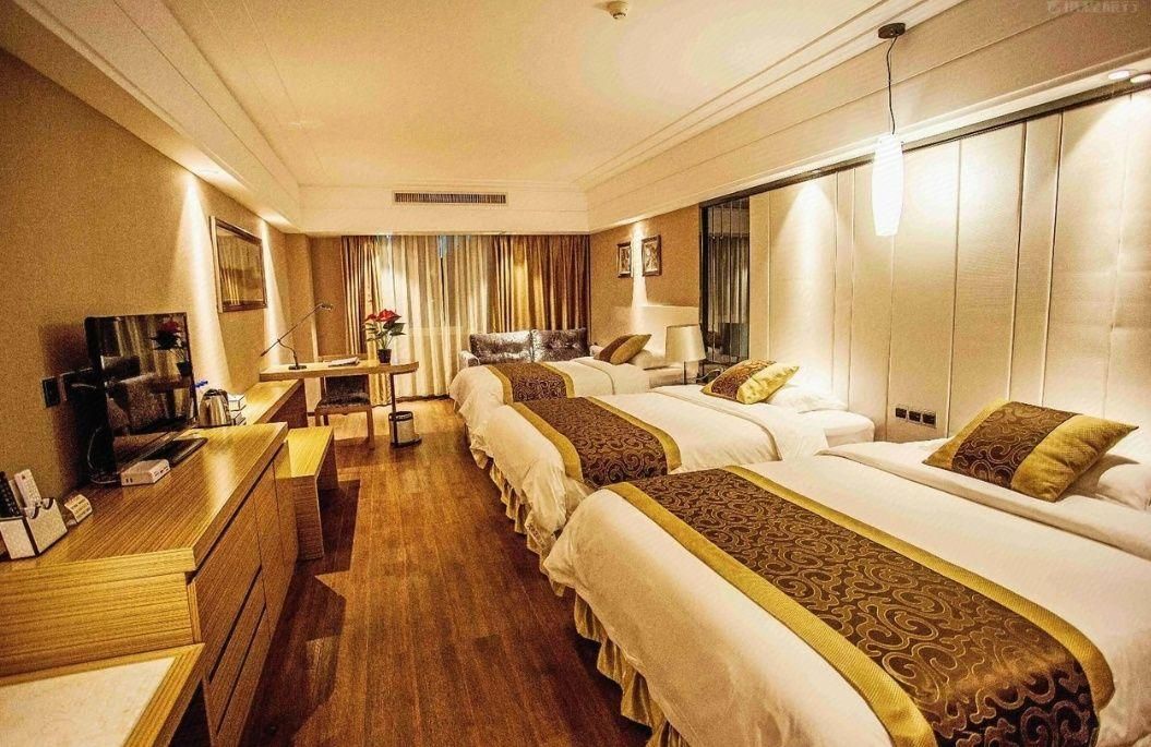 Bingang International Hotel (Xishuangbanna Splash Plaza) - Xishuangbanna - Habitación