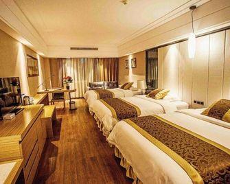 Bingang International Hotel (Xishuangbanna Splash Plaza) - Xishuangbanna - Habitación