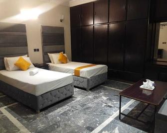 Hotel Royal Grand - Láhaur - Ložnice
