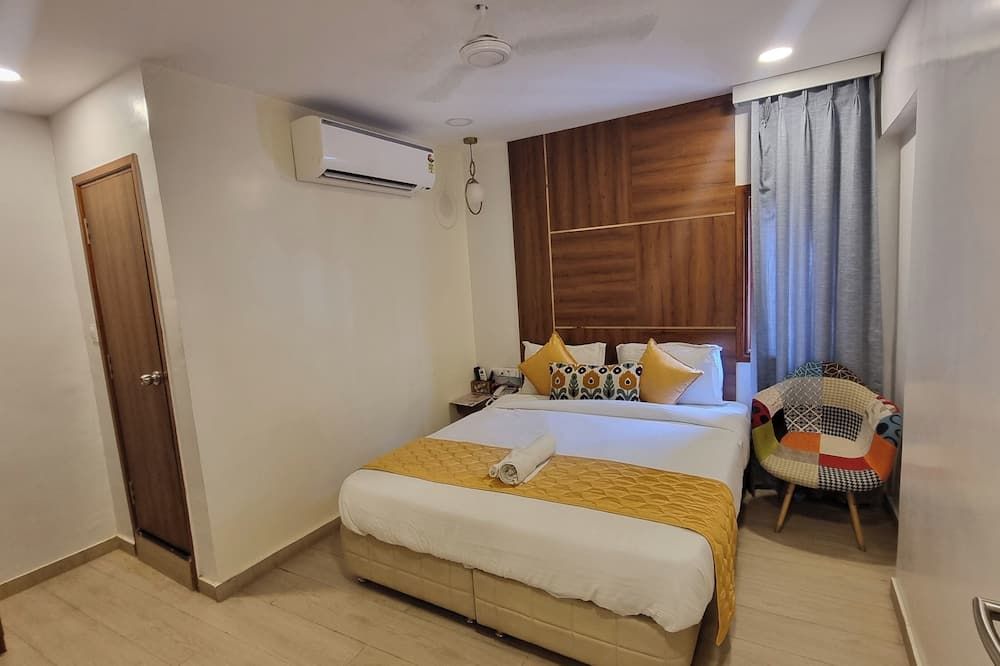 Hotel Hinduja Empire - Surat - Schlafzimmer