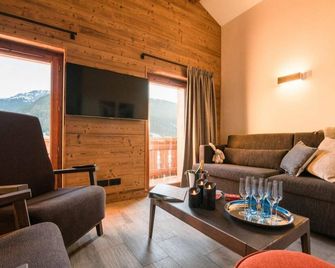 Chalet, fitness, sauna, hammam, terrace, balcony, fireplace or stove, parking, tv, ski locker - Praz-sur-Arly - Wohnzimmer