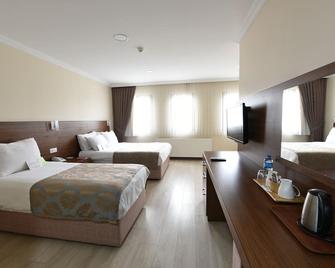 Asal Hotel - Ankara - Phòng ngủ