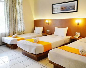 Hotel Metropole - Batu - Camera da letto