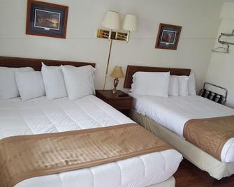 Budget Host Inn - Detroit Lakes - Schlafzimmer
