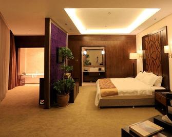Xinding Holiday Inn - Enshi - Bedroom