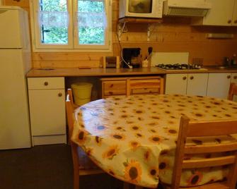 wooden chalet 6/8 people in the countryside with fishing pond - Saint-Agnan - Comedor