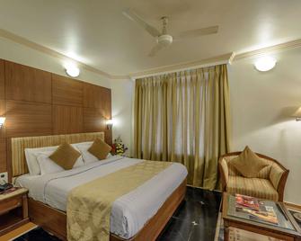 Comfort Inn President - Ahmedabad - Κρεβατοκάμαρα
