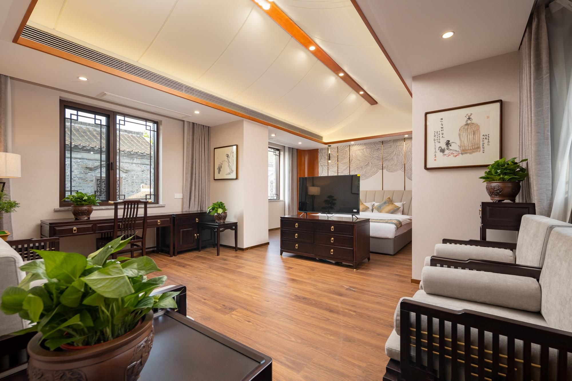 Floral Hotel · Yangzhou Dongguan Street Fuyuan hotel(Ancient Canal Store) - האנגז'ו - חדר שינה