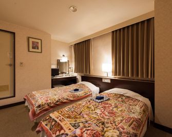 Business Hotel Suzuya - Takasaki - Slaapkamer