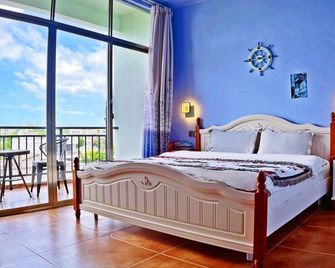 Weizhou Island Right Bank Travel Residence - Beihai - Huiskamer