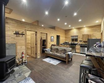Deer Cabin - Next to National Forest and Snowmobile Trails - Private Hot Tub - Dubois - Living room