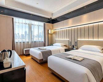 Tianci Hotel (Jiangsu Nanshan Park Xinzhi Hotel) - Jiujiang - Bedroom