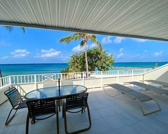 Sandy Beach at Sunset Cove - Ocean Front - George Town - Balcon