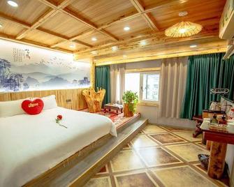 Home Inn Huayi Hotel (Wudangshan Jingqu Rukou Road) - Š-jen - Ložnice