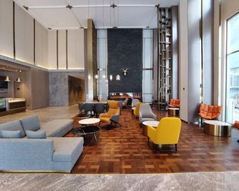 Echarm Plus Hotel Jingdezhen Sanbao Jiuji Town - Jingdezhen - Lounge