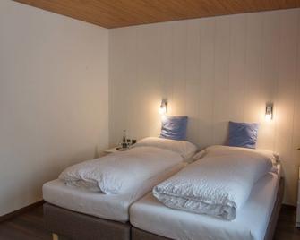 Hotel Garni Rösslipost - Unteriberg - Bedroom