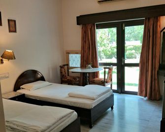 Hotel Ganesha Garden Villa - Khajurāho - Bedroom