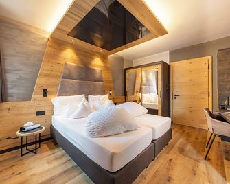 Hotel Faloria - מואנה - חדר שינה