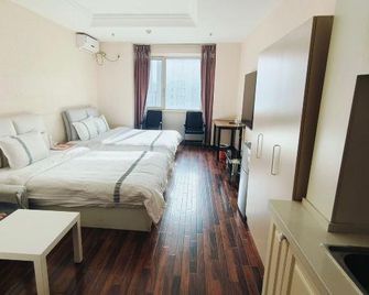 Shenyang Jingwan Apartment (Northeastern University Nanhul Campus) - Shenyang - Living room