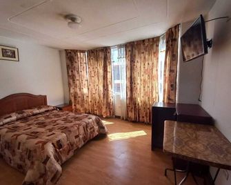 هوستال أزيري بونو - بونو - غرفة نوم