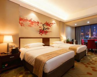 Unibo International Hotel (Ganzhou Station) - Ganzhou - Slaapkamer