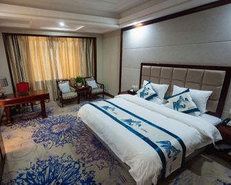Guoyuan Hotel - Taizhou - Schlafzimmer