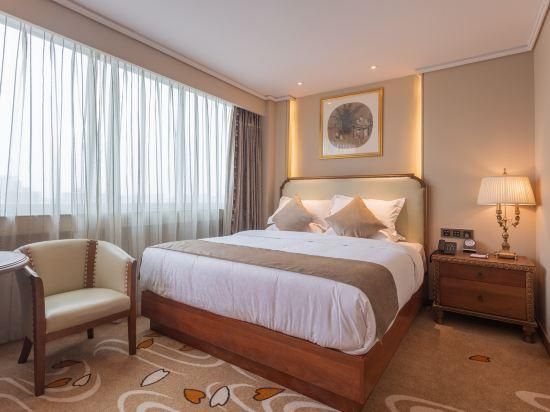 Century Plaza Qidu Hotel - Zibo - Schlafzimmer