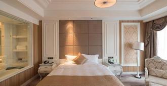 Da Tong Weidu International Hotel - Datong - Schlafzimmer
